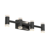 A modern black wall-mounted light fixture with five cylindrical LED lights, arranged horizontally on two parallel bars, each cylinder featuring clear textured ends that emit light.