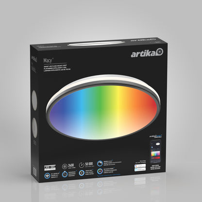A box of the Artika Macy 15 in. LED modern flush mount light RGB Wifi shows a circular black ceiling light with a rainbow gradient, highlights app compatibility and lighting specs, and features a phone image with lighting controls.