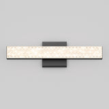 A modern wall-mounted LED light fixture with a rectangular frosted glass shade featuring a textured pattern, attached to a dark square metal base against a plain light gray background.