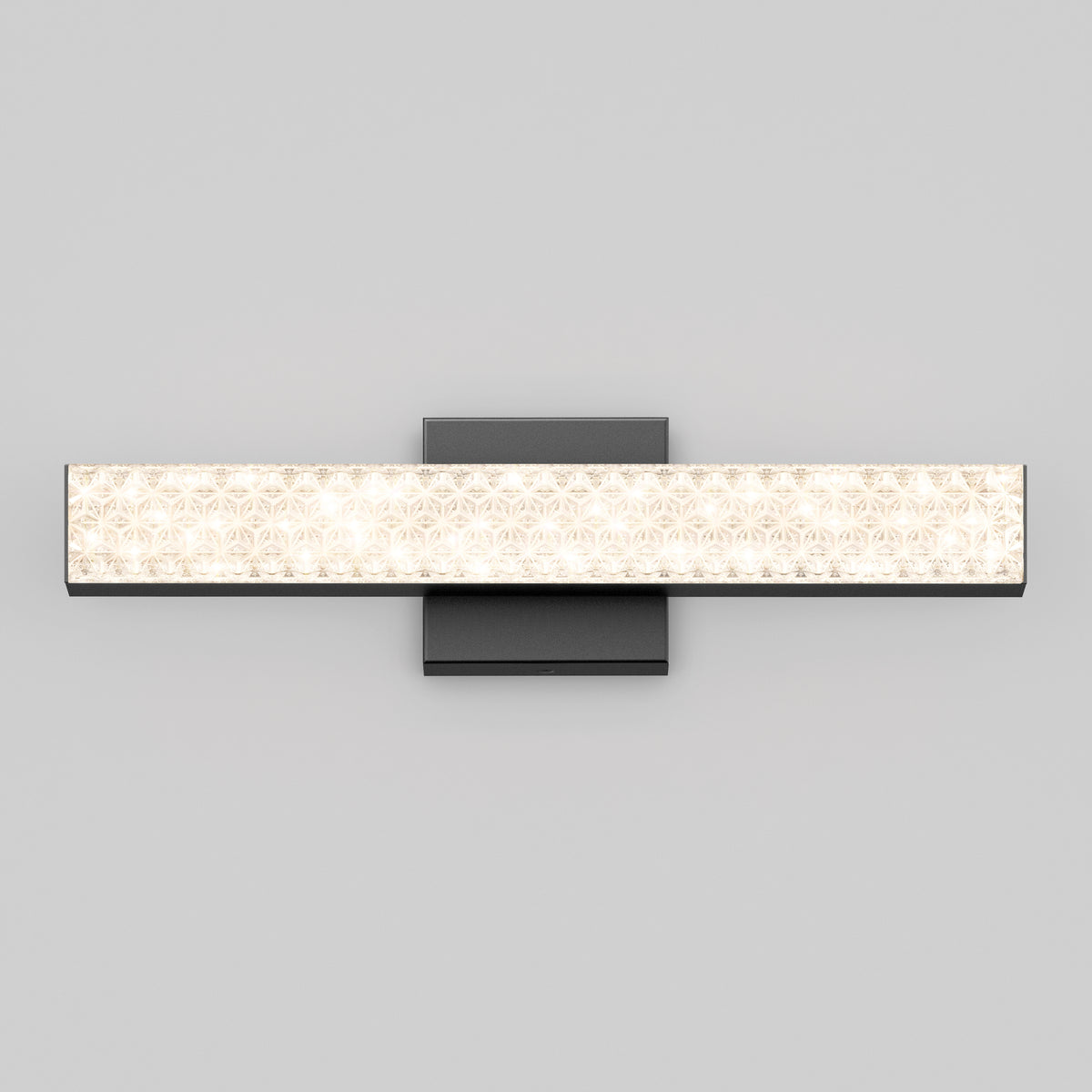 The Artika Adeline 18-in Integrated LED Vanity Light Bar features patterned glass and a dark backplate, ideal for bathroom mirror lighting.