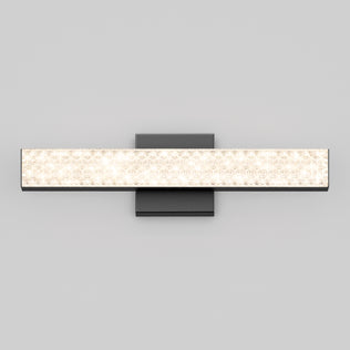 The Artika Adeline 18-in Integrated LED Vanity Light Bar features patterned glass and a dark backplate, ideal for bathroom mirror lighting.