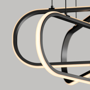 Close-up of the Artika Lewis modern LED pendant light 3 CCT, featuring smooth, curved black metal frames and integrated LED strips, set against a plain grey background.