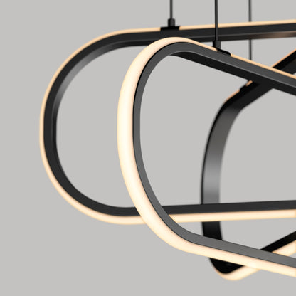 Close-up of the Artika Lewis modern LED pendant light 3 CCT, featuring smooth, curved black metal frames and integrated LED strips, set against a plain grey background.