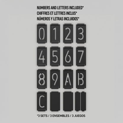 The Artika Bowen solar LED outdoor address wall light 5 CCT includes sixteen black tiles with white numbers (0-9) and letters (A, B, C), plus three blanks—perfect for displaying your address in multiple languages.