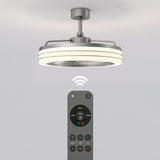 A modern ceiling fan with integrated LED light is mounted on the ceiling. A remote control with multiple buttons is pointed at the fan, and a wireless signal icon is shown between them.
