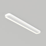 A modern, rectangular, white ceiling light fixture with rounded edges, installed on a plain light gray ceiling. The light is on, emitting a soft, even glow.