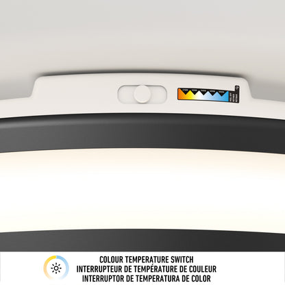 Close-up of the Artika Hemisphere 15 in. LED flush mount light’s color temperature switch, featuring a multi-setting slider. A label in English, French, and Spanish reads "Colour Temperature Switch" and "adjustable brightness.
