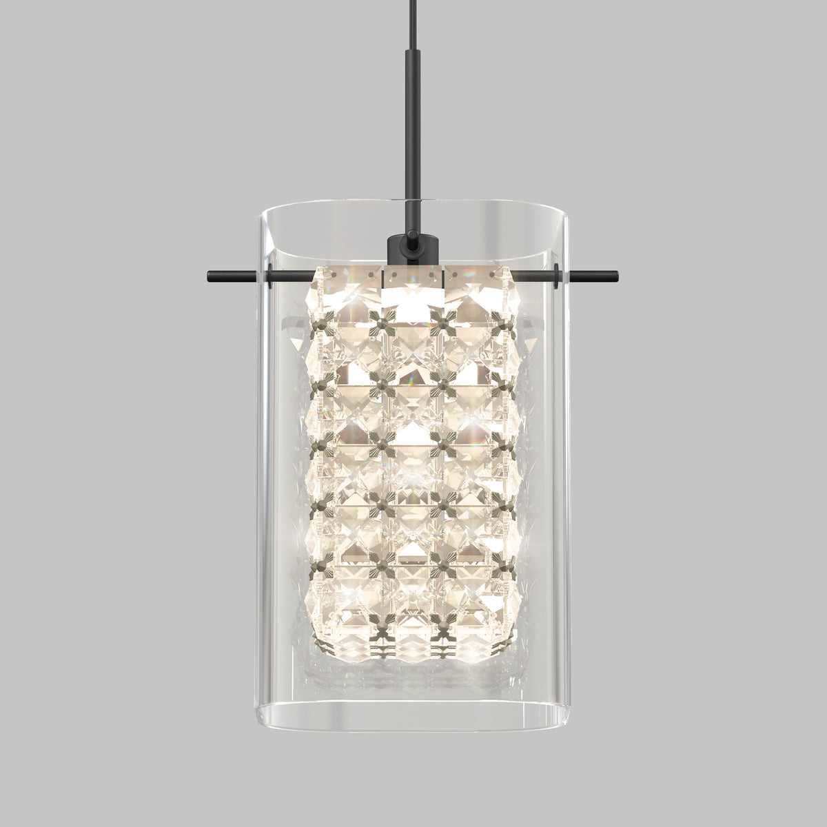 The Artika Crystal Cube 1-light LED pendant features a clear cylindrical glass shade and inner faceted crystals suspended from a black rod, shown against a plain gray background.