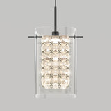 A modern pendant light with a clear rectangular glass shade and an inner layer of faceted crystal elements, suspended from a black rod against a plain gray background.