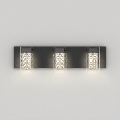 The Artika Crystal Cube LED bathroom vanity light 5 CCT is a modern wall-mounted fixture with three rectangular lights, each with a crystal-like glass cover, all set on a sleek black base.