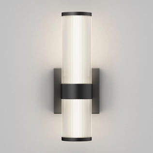The Artika Mirado modern LED wall sconce 5 CCT features two vertically aligned frosted ribbed glass shades on a matte black square backplate, offering soft, even light and versatile style.