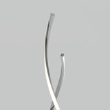 Two sleek, metallic, curved rods twist upward against a plain, light gray background. One rod is illuminated along its edge, highlighting the modern, minimalist design.