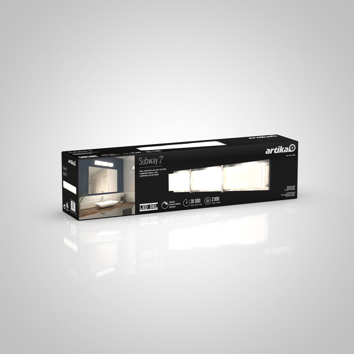 A rectangular black box for the Artika Subway 2 LED light fixture, showing an image of the light installed above a bathroom mirror and listing features like LED technology and a 20,000-hour lifespan.