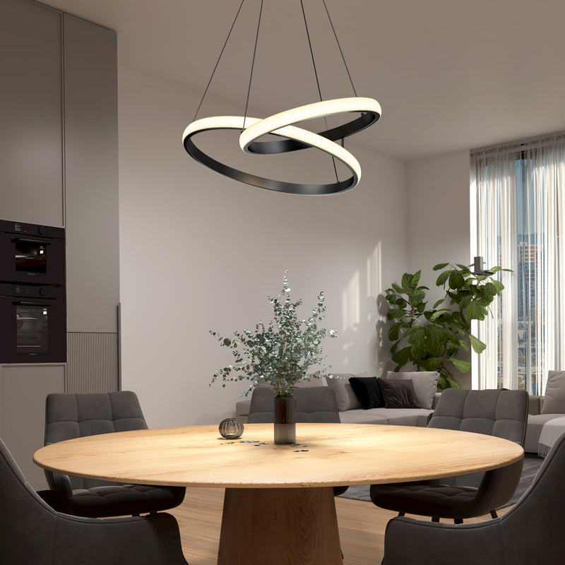 Modern dining with Mora 28″ LED Pendant by Artika, gray chairs, round wood table, plant; features adjustable 5CCT color temperature.