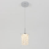 A modern pendant light with a cylindrical glass shade featuring a textured, crystal-like pattern, hanging from a thin metal wire and a round chrome ceiling mount against a plain white background.