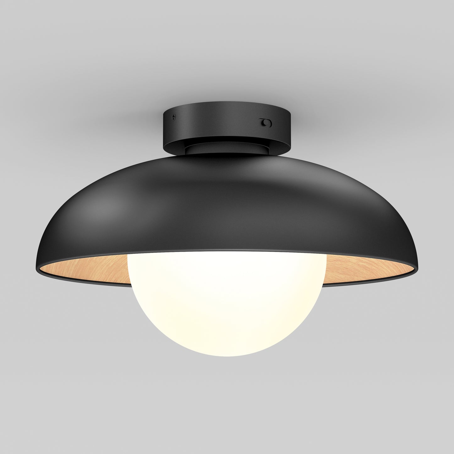 The Artika Boden LED flush mount light features a matte black dome-shaped shade and a white globe bulb, mounted on a gray ceiling.