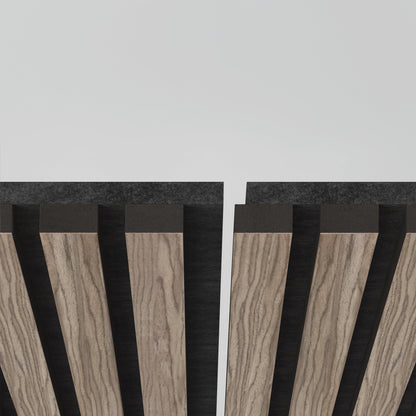 A close-up of the Artika-CAN-dev Sonolok 15.5 ft sound-absorbing wall panel kit shows vertical wooden slats with dark edges, aligned in parallel rows with gaps, set against a plain white background.