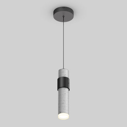 The Artika Barden 1-light LED pendant features a modern cylindrical design with a concrete finish, suspended by a slim black cord against a plain light gray background.