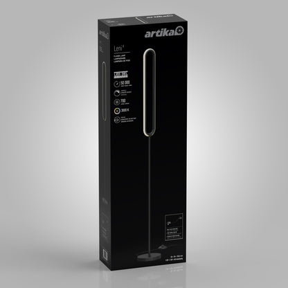 Black packaging box for the Artika Leni dimmable LED modern floor lamp, featuring a picture of the lamp, details like 50,000-hour lifespan, 700 lumens brightness, 3000K color temperature, and the Artika logo on a gray background.
