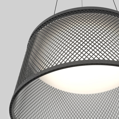 A close-up of the Artika Adrian LED pendant light 3 CCT, featuring a modern black metal mesh shade and soft white glow, set against a plain gray background.