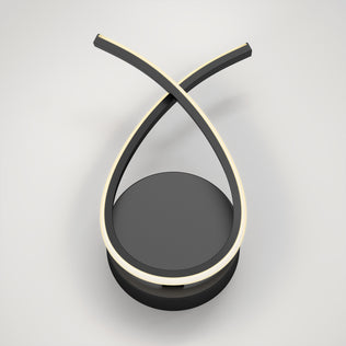 The Artika Gamma modern LED wall sconce 5 CCT features two curved black arms crossing at the top with integrated LED strips, all on a round black base, creating a minimalist modern look.