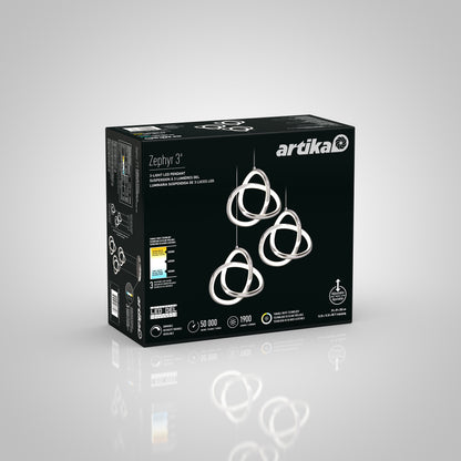 A black box for the Artika Zephyr 3-light LED pendant, showcasing three interlocking rings on the front, plus product specs and energy details on the side, set against a plain gray background.