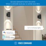 Modern hallway with stairs and wall-mounted lights. Text prompts voice control for entrance lights using Google Assistant or Amazon Alexa, emphasizing hands-free operation in English and French.