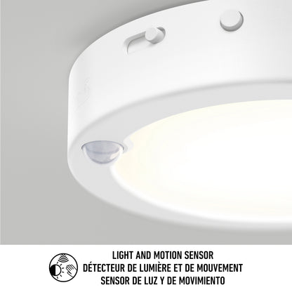 Close-up of Artika Accent under cabinet LED light 3CCT with built-in sensor. Text reads: Light and motion sensor / Détecteur de lumière et de mouvement / Sensor de luz y de movimiento, with a hand and waves icon.