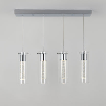 The Artika Essence 4-light LED pendant features four cylindrical glass shades suspended by thin wires with chrome accents, shown against a plain light gray background.