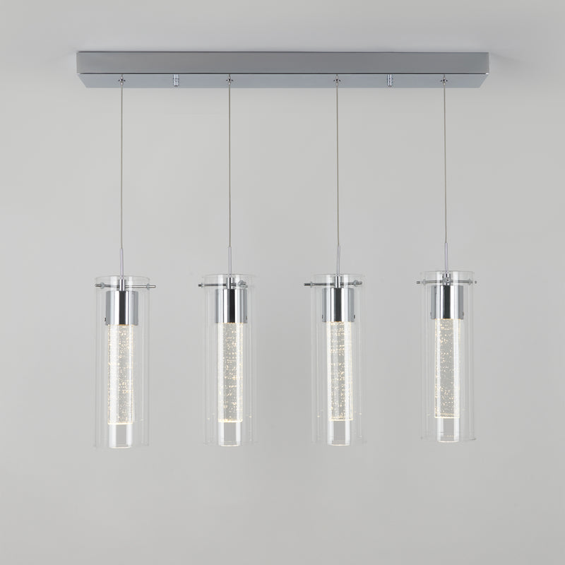 The Artika Essence 4-light LED pendant features four cylindrical glass shades suspended by thin wires with chrome accents, shown against a plain light gray background.