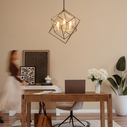 A modern home office features a wooden desk with a laptop, flowers, and decor. A woman passes art on the wall beneath the Artika Harmonium modern mid-century pendant light. Neutral tones and green plants finish the look.