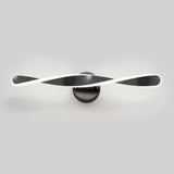 A modern wall-mounted LED light fixture with two intertwined, curved black and white bars, emitting a soft glow, set against a plain gray background.