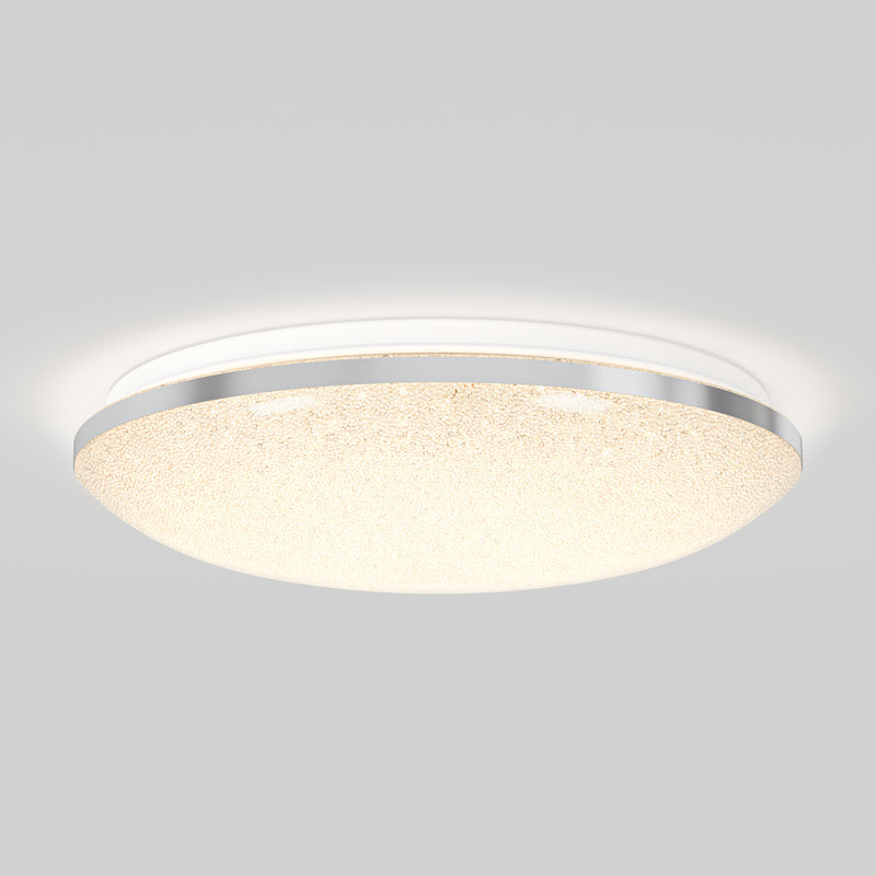 The Artika Sparkle 15 in. LED modern flush mount light features a textured, glowing surface and slim metallic rim, adding contemporary style to any plain white ceiling with its adjustable 5 CCT lighting.