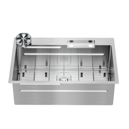 The Artika Neoflow single bowl stainless steel sink features a rectangular basin, two faucet holes, a center round drain, a bottom metal grid, and a circular attachment in the top left corner.