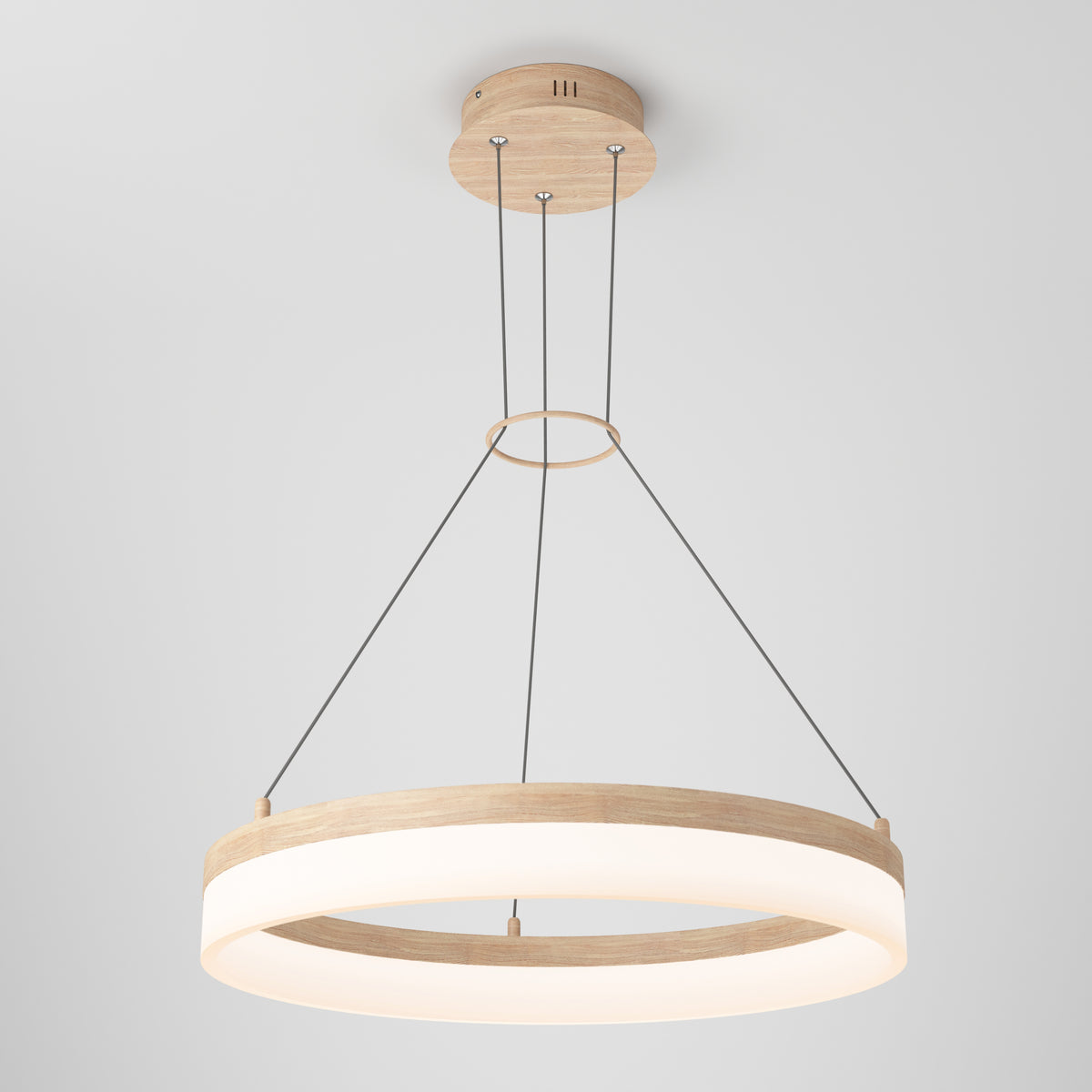 The Artika Optical LED pendant light 3 CCT features a modern circular design with a wooden finish, suspended by four black cables. Its ring emits a soft white glow, highlighting minimalist style against a plain white background.