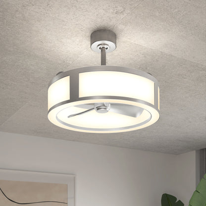 The Artika Huxley 23 in. LED modern ceiling fan with 3 speeds and silver accents features a circular LED light and three blades, shown mounted on a gray ceiling in a contemporary, neutral-toned room.