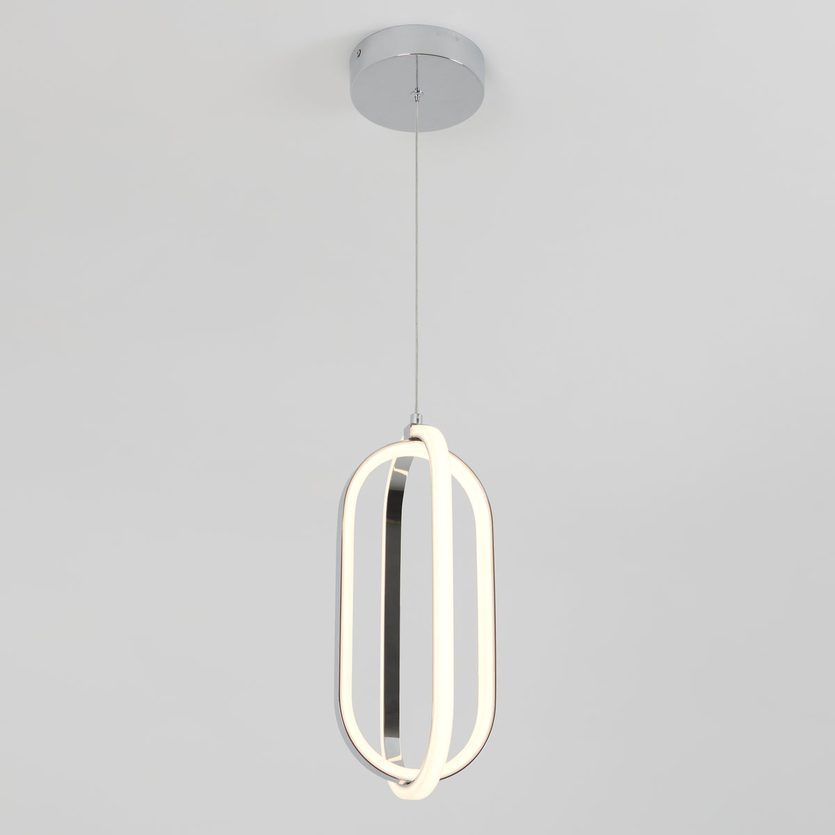 Modern pendant light with an oval, geometric LED design, suspended from a round chrome ceiling mount by a thin cord, against a plain white background.