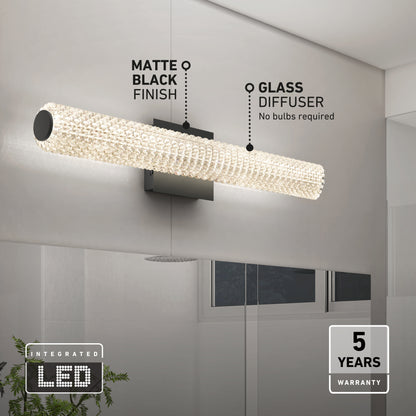The Artika Exalto LED bathroom vanity light features a matte black finish, integrated LED, glass diffuser, and comes with a 5-year warranty—perfect for installing above your bathroom mirror.